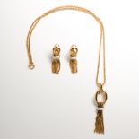A Retro fourteen karat gold and diamond earring and pendant necklace suite