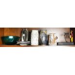 A collection of art pottery vases and decorative items
