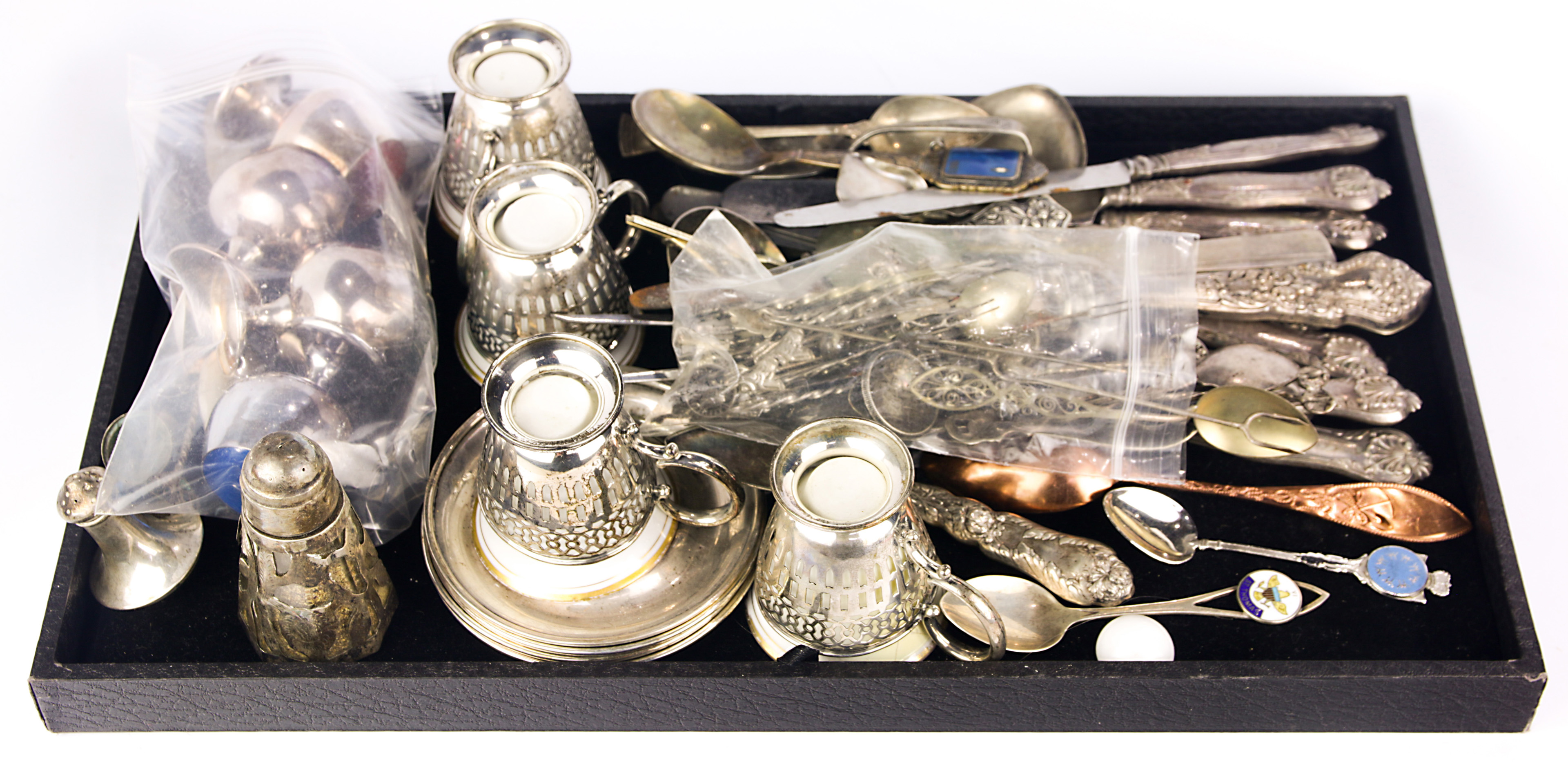 A collection of assorted silverplate and sterling table articles