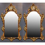 A near identical pair of Venetian giltwood mirrors, 18th century