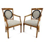 A pair of Neoclassical style armchairs