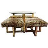 A Modern faux leopard and brass cocktail table and (4) stools