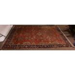 An antique Persian Serapi carpet