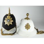 A (lot of 2) British helmets incl British Devonshire Regiment and British Naval