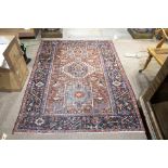 A Persian Heriz carpet