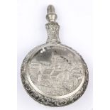 A Nurnberg plated scent bottle with a cityscape in raised relief