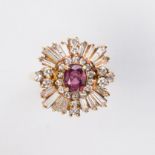 A ruby, diamond and fourteen karat gold ring