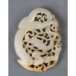 A Chinese white jade dragon plaque