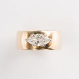 A diamond and fourteen karat gold ring