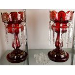 A pair of Bohemian style cranberry glass lustres
