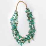 A turquoise and heishe necklace
