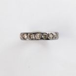 A diamond and blackened sterling silver band ring