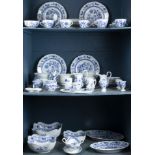Three shelves of Hutschenreuther Blue Onion china