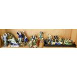 A shelf of mostly Chinese Shiwan figures