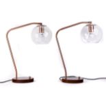 A pair of industrial style table lamps