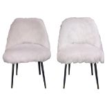 A pair of contemporary Vitra style upholstered faux fur side chairs