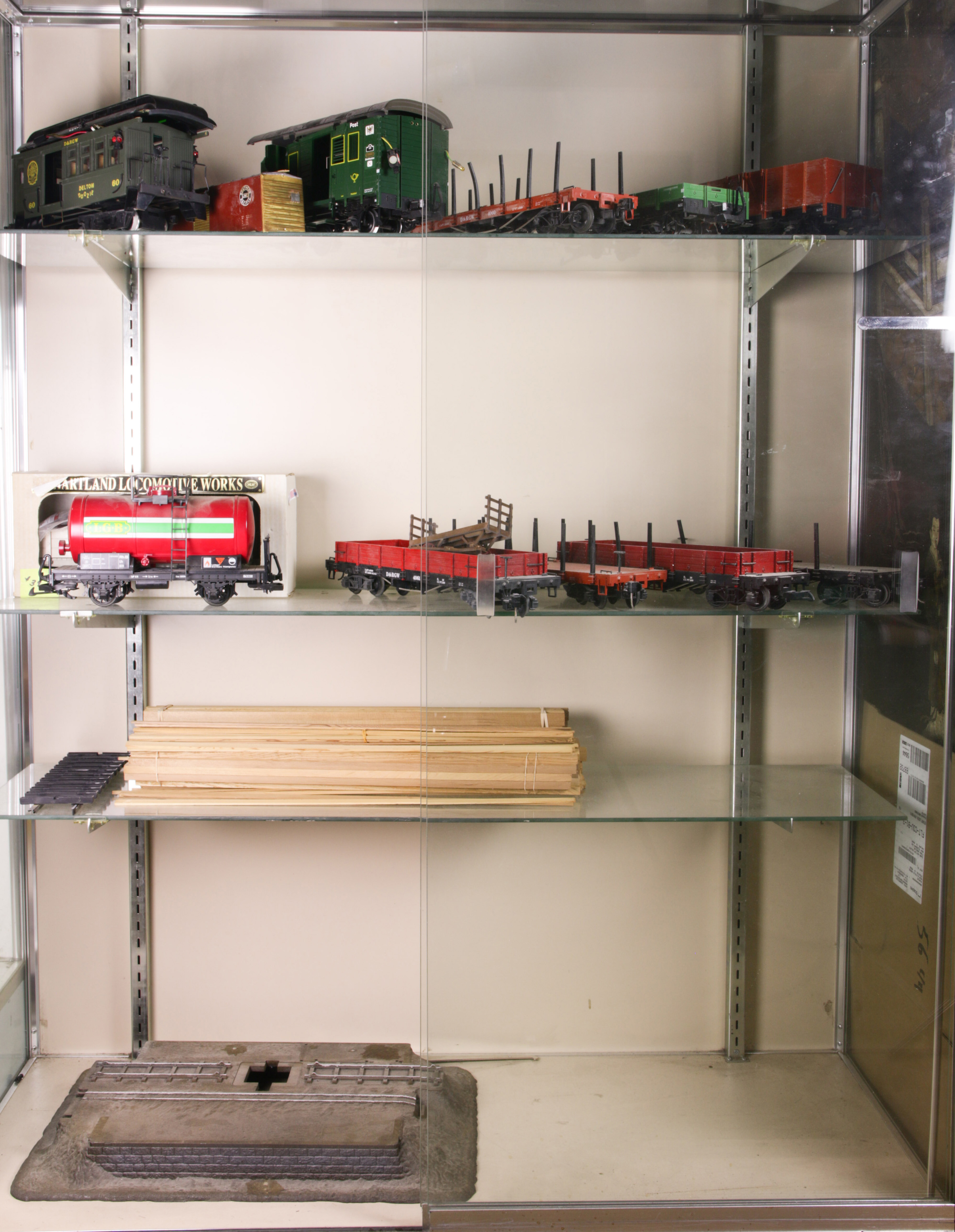 Lot of 4 shelves mostly LGB models, track, cars, etc