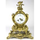 A Louis XV style gilt bronze mantle clock