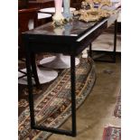 Black lacquer console table, fitted with three side by side drawers