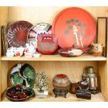 Two shelves of Japanese porcelain and lacquer wares