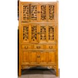 A Chinese pine cupboard