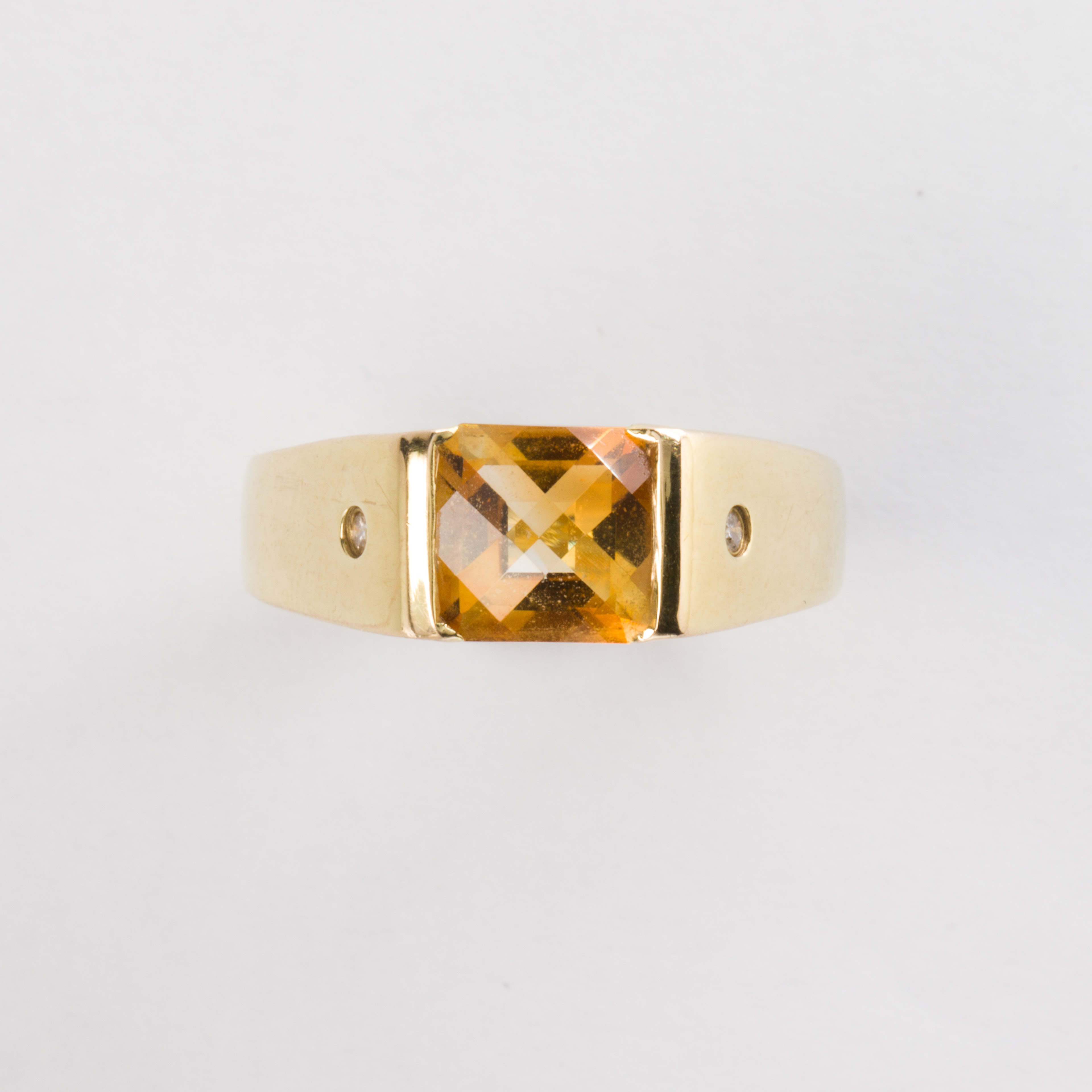 A citrine and fourteen karat gold ring