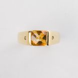 A citrine and fourteen karat gold ring