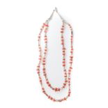 A group of coral and silver necklaces