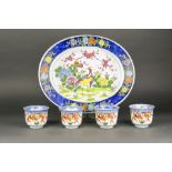 (lot of 5) Four Chinese Imari cups with a famille rose plate