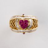 A ruby, diamond and eighteen karat gold ring