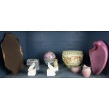 One shelf of pottery and glass decoratives