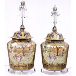A pair of polychrome decorated table lamps in the Chinoiserie taste