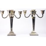 A pair of Sheffield style silver plate candelabra