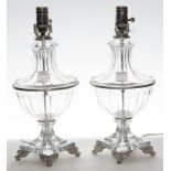 Pair of Schonbek glass urn form lamps rising on a white metal square base