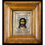 A Russian cloisonne enamel .84 silver oklad icon of Jesus