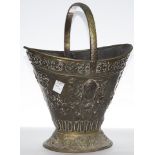 A Continental hammered brass umbrella stand