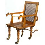 A fruitwood invalids chair circa 1860