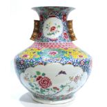 A Chinese Famille Rose 'Floral' Zun Vase