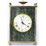 A hardstone and brass table clock