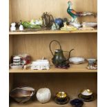 Three shelves of decorative items