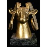 A Hollywood Regency style figural sculpture of a ram's head
