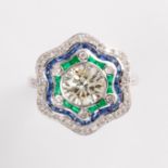 A diamond and gemstone platinum ring
