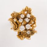 A diamond and fourteen karat gold ring