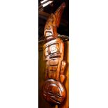 A Haida mother of pearl inlaid bird carving