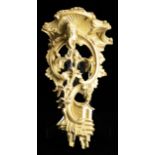 An English giltwood and gesso carved wall bracket circa 1870