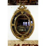 A Rococo style giltwood mirror, 19th century