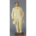 Chinese shiwan ceramic figure of a man in western suit