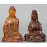 Two Chinese amber colored composition figures of seated Bodhisstvas