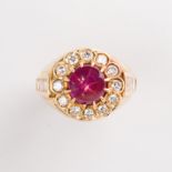 A star ruby, diamond and eighteen karat gold ring