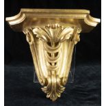 A Rococo style Italian giltwood carved wall mount